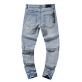 Amiri Jeans Ripped Patch Slim Fit Stretch Jeans
