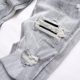Amiri Jeans Ripped Stretch Jeans