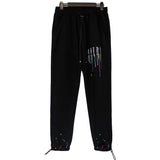 Amiri Jeans Color Foam Letters Splash-Ink Sweatpants for Men and Women